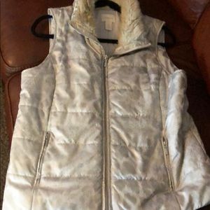 Warm winter vest with faux fur collar.